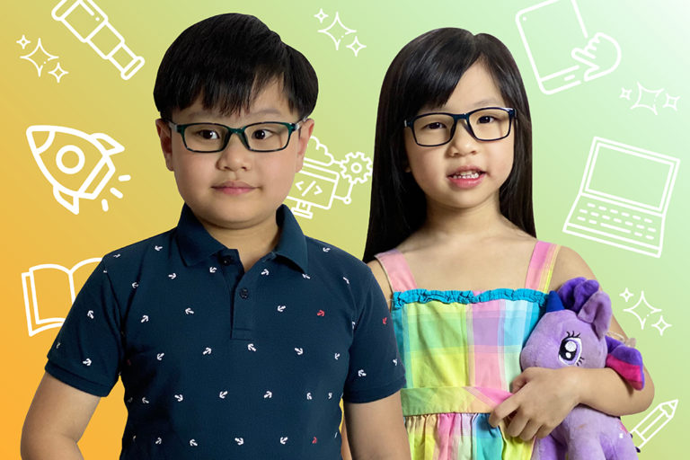 Two kids wearing anti-blue light glasses.