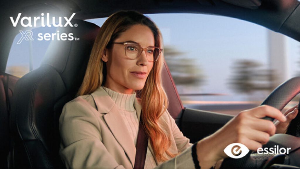Woman driving while wearing Essilor Varilux XR multifocal/progressive lenses